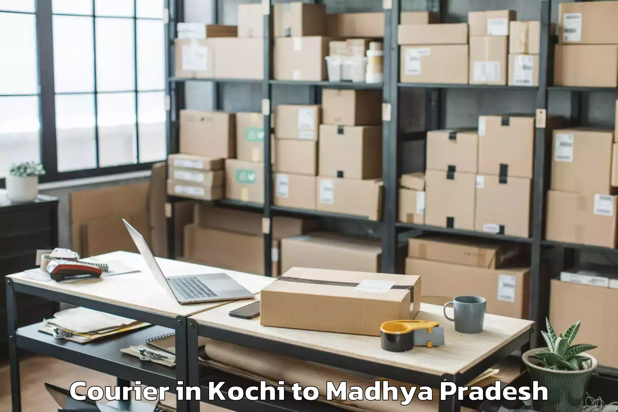 Book Kochi to Anjad Courier Online